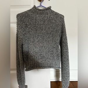 Black and white knit sweater. Only worn a few times. Great condition